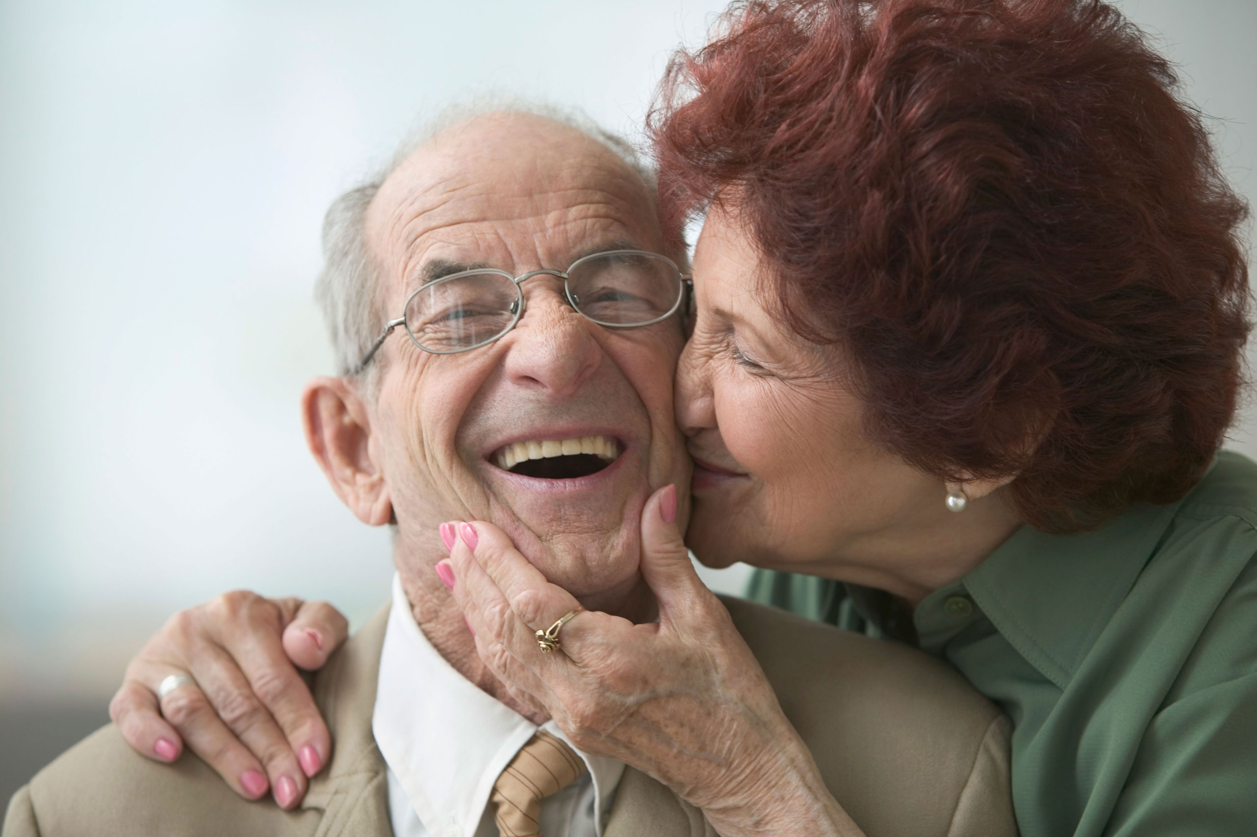 senior-couple-kiss-cheek.jpg